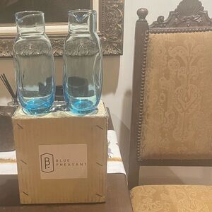 NIB “Blue Pheasant” medium soft blue carafes, hand Blown